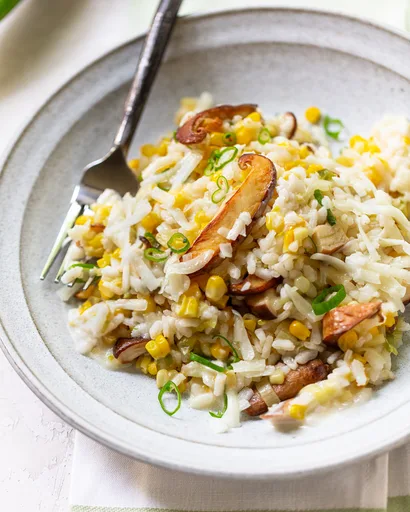 Risotto de maíz dulce con queso cheddar y champiñones