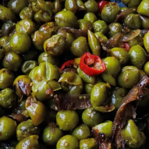 Sri Lankan tempered thibbatu (turkey berry, wild eggplant, pea eggplant).