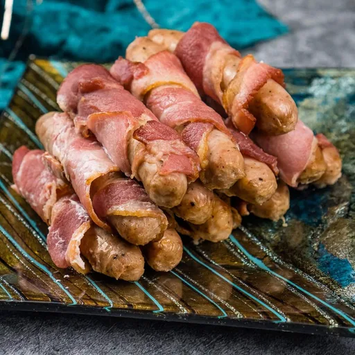 Salchichas envueltas en tocino
