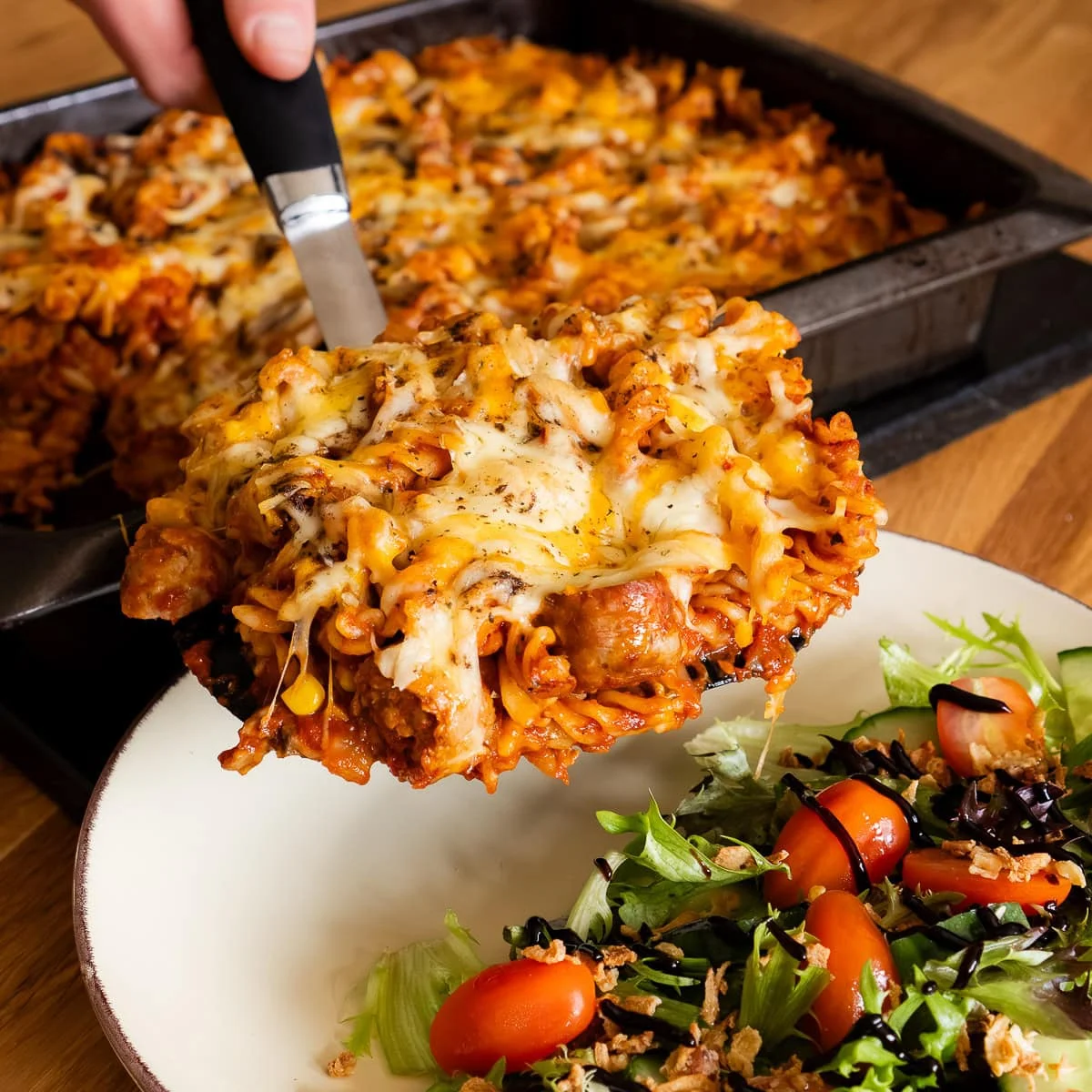 Easy Sausage Pasta Bake with Tomato Sauce and Cheese Topping