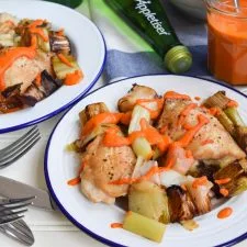 Chicken Thighs with Roasted Leeks & Romesco Sauce