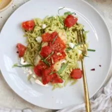30-Minute Baked Cod with Tomatoes and Pesto Orzo