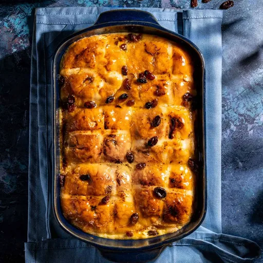 Hot cross bun bread and butter pudding