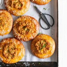 Caramelised Onion, Goat Cheese, and Sundried Tomato Pesto Pretzel Buns
