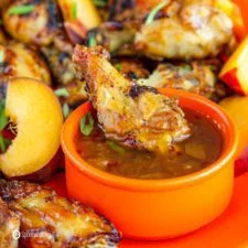 Air Fryer Chicken Wings with Hot Pepper Peach Bourbon Sauce