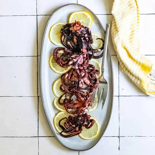 Pulpo a la plancha con aliño de limón y pimienta