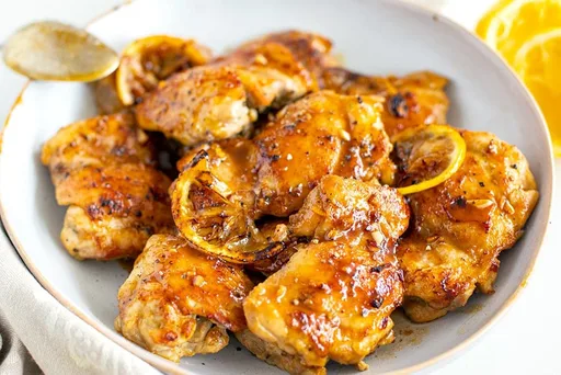 Muslos de Pollo a la Miel, Limón, Ajo y Pimienta