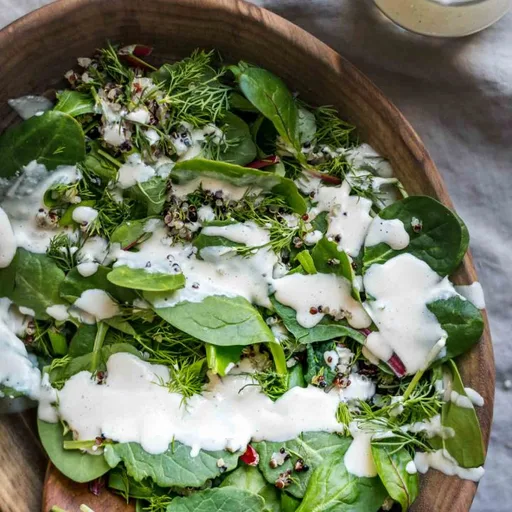 Quinoa, Dill, and Baby Greens Salad with Creamy Lemon Tahini-Yogurt Dressing