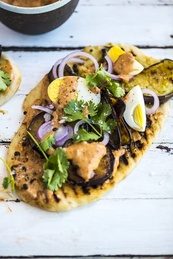 Olive Oil Flatbreads with Fried Aubergine, Boiled Eggs and Harissa Mayo