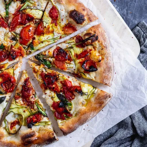 Vegan Pizza Primavera with Zucchini, Asparagus, and Burst Cherry Tomatoes