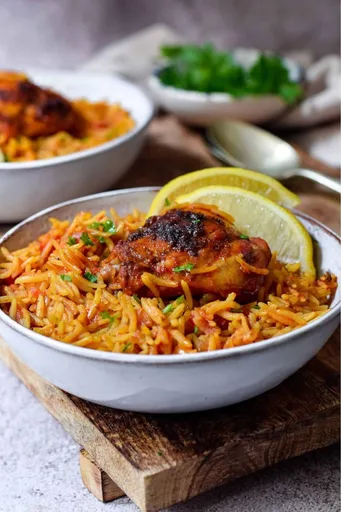 Pollo con arroz a la española