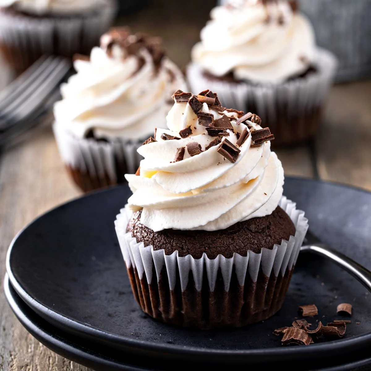 Filled Guinness Chocolate Cupcakes with Irish Cream Whipped Cream Frosting