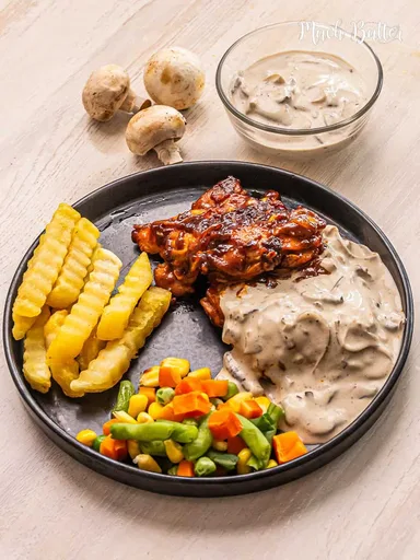 Filete de pollo con salsa de champiñones