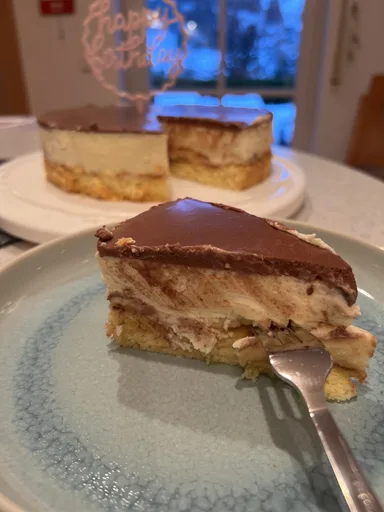 Banana Cake with vanilla cream and chocolate