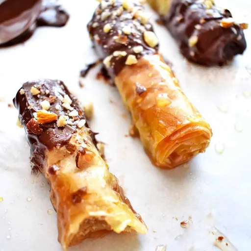 Chocolate-Dipped Mini Baklava Rolls