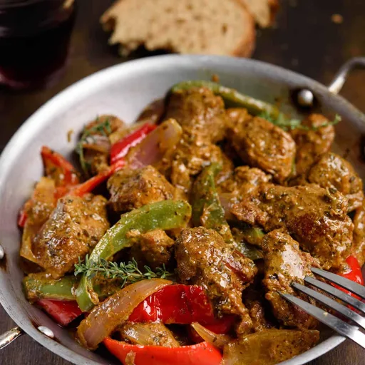 Cerdo salteado con pimientos y cebolla (Tigania de cerdo)