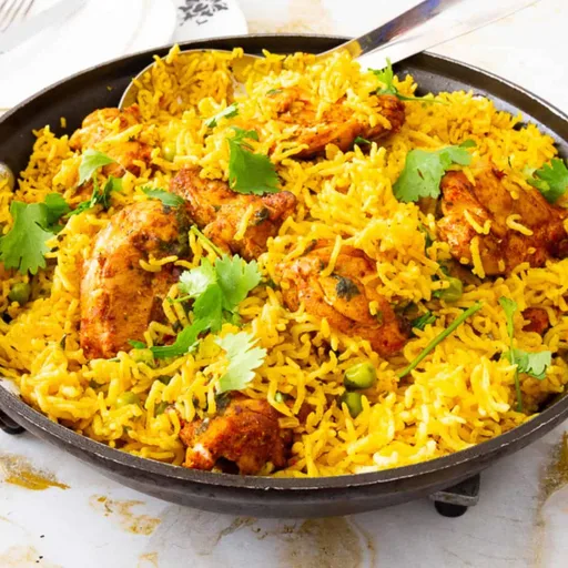 Arroz con cúrcuma y pollo
