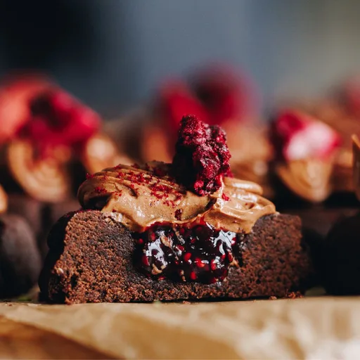 Chocolate and Raspberry Thumbprint Cookies - Pihikete Tapukara Tiakarete me Te Rahipere