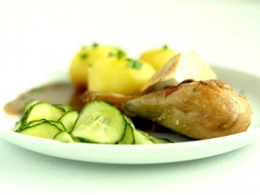 Pot-roasted chicken with split gravy and cucumber salad