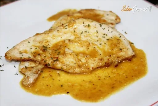 Pechuga de pollo en salsa de naranja