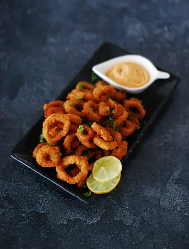 Calamar frito a la mantequilla y ajo