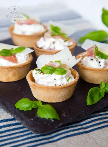 Canapés de Grana Padano y Prosciutto di San Daniele