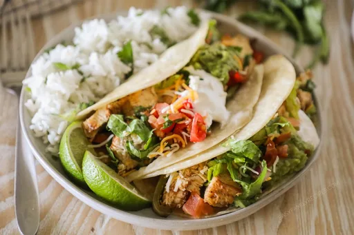 Tacos de fajitas de pollo