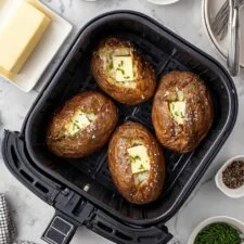 Air Fryer Baked Potatoes with Butter and Black Pepper Recipe