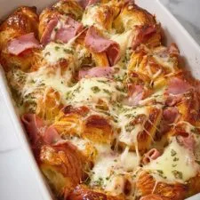 Croissant Bake with Deli Meats, Cheese, and Honey Herb Butter Recipe