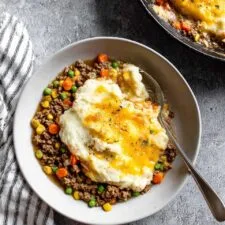 Hearty Cottage Pie with Beef, Sausage, and Mashed Potato Topping Recipe