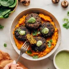 Spicy Black Bean Mushroom Fritters with Cilantro and Avocado Crema Recipe