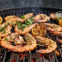 Grilled lemon-garlic prawns on the barbecue