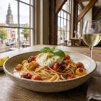 Pasta with roasted tomatoes and burrata