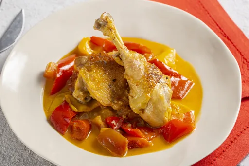Pollo con pimientos a la romana