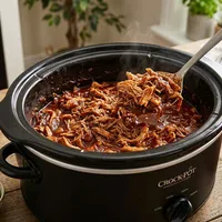Pulled chicken uit de slowcooker