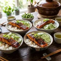 Japanese rice with teriyaki salmon and pickled cucumber
