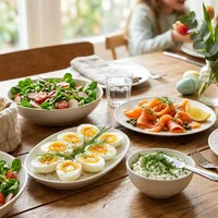 Easter brunch with eggs, salmon and fresh herbs