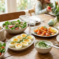 Easter brunch with eggs, salmon and fresh herbs
