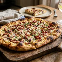 Classic Flammkuchen with crème fraîche and bacon