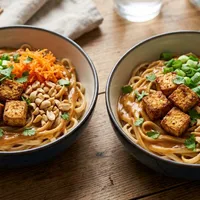 Quick rice noodles with peanut sauce and crispy tofu