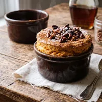 Gluten-free sweet potato soufflé with cinnamon and pecans
