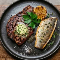 Surf and turf avec bar grillé et entrecôte