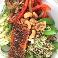Best healthy comfort food ever: a packed bowl with vegetables, quinoa and salmon