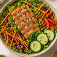 Asian salad with sesame chicken