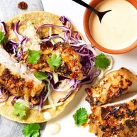 Cool chicken tacos with cabbage and coriander