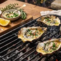 Grilled oysters with herb butter