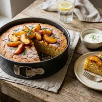 Gluten-free polenta cake with roasted peach and rosemary