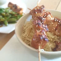 Chicken skewers with noodles and sweet-and-sour sugar snap peas