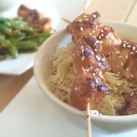 Chicken skewers with noodles and sweet-and-sour sugar snap peas