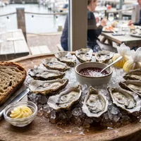 Oysters with mignonette sauce and crusty bread